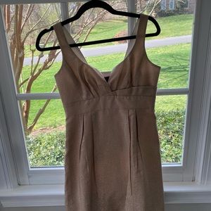 Super cute gold cocktail dress! Fun details, flattering and comfortable